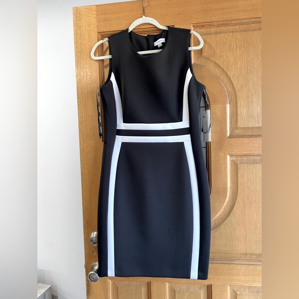 New w/tags,Calvin Klein black/white dress. Size 12,please see pics for details.